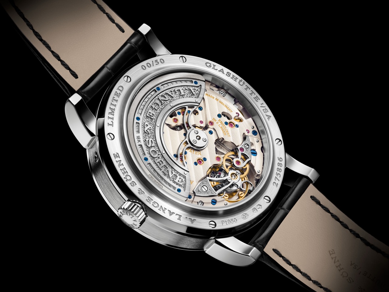 Side profile of the Lange 1 Tourbillon Perpetual Calendar Lumen in 950 platinum on black alligator strap