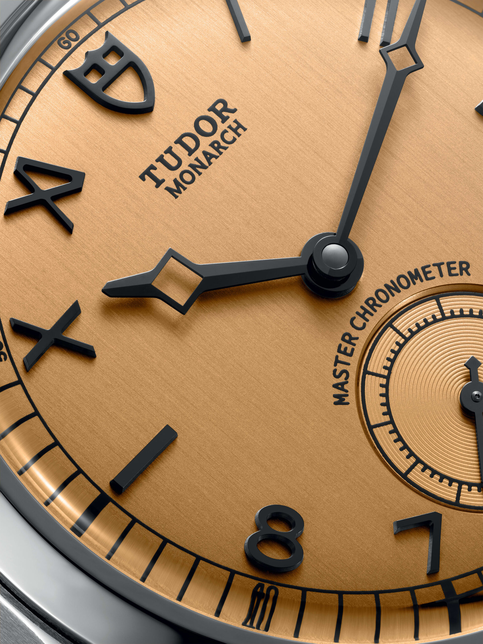TUDOR Monarch showing its faceted stainless steel bracelet and papyrus-inspired dial
