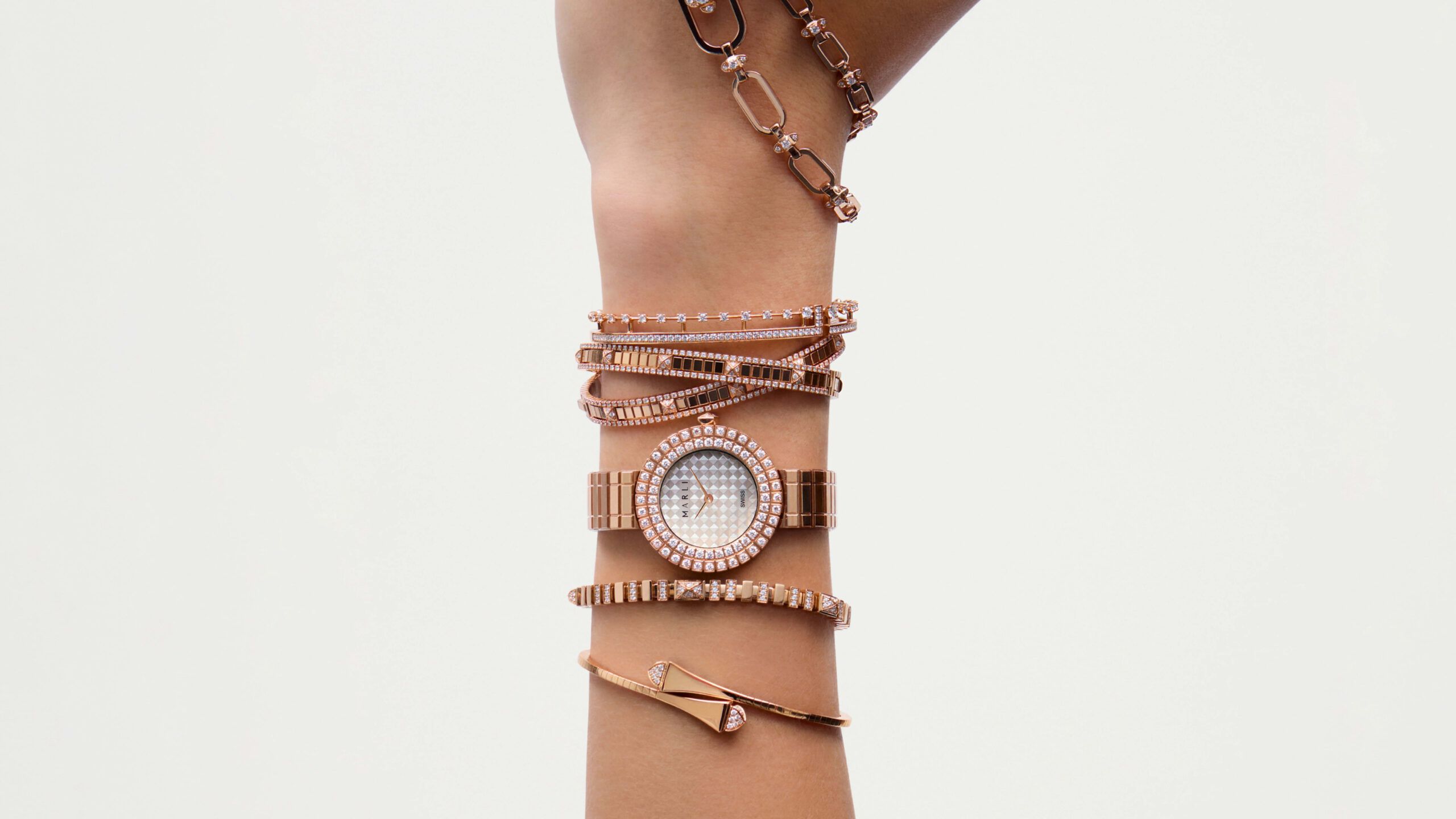 MARLI Timepiece L35 lifestyle composition emphasising the rubber strap with embossed pyramid motif