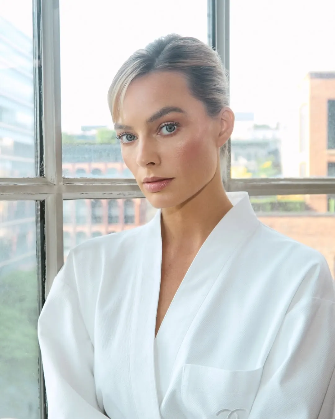 Margot Robbie in custom CHANEL dress at the 2026 Met Gala with glowing cheeks and luminous-matte lips