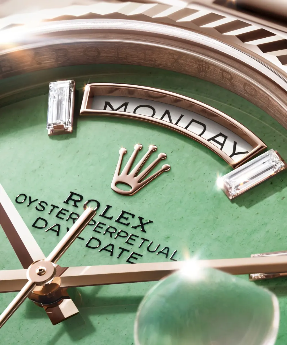 Rolex Day-Date 40 in Jubilee Gold with bright green aventurine dial and baguette-cut diamond hour circle