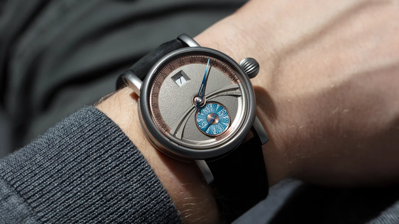 Chronoswiss Delphis Art Deco dial showing jumping hour and retrograde minute in 42mm titanium case