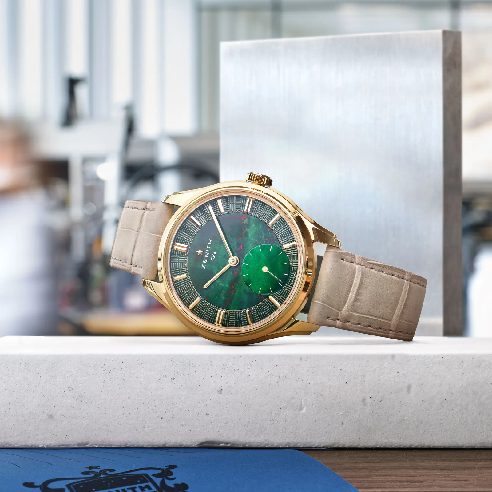 Zenith Calibre 135 movement with Côte de Genève and ruthenium finish visible through sapphire caseback