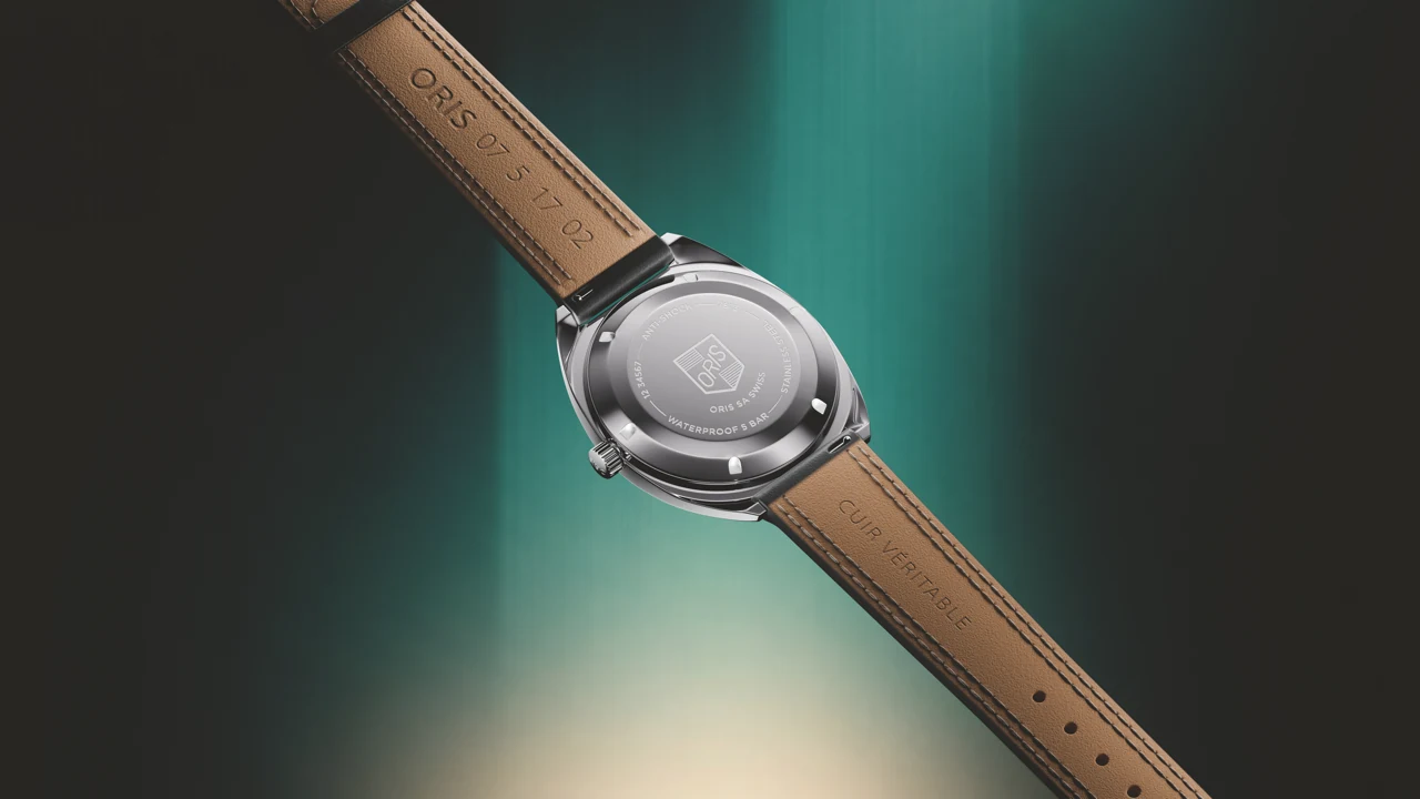 Oris Star Edition barrel-shaped case with silver dial and plexi-crystal