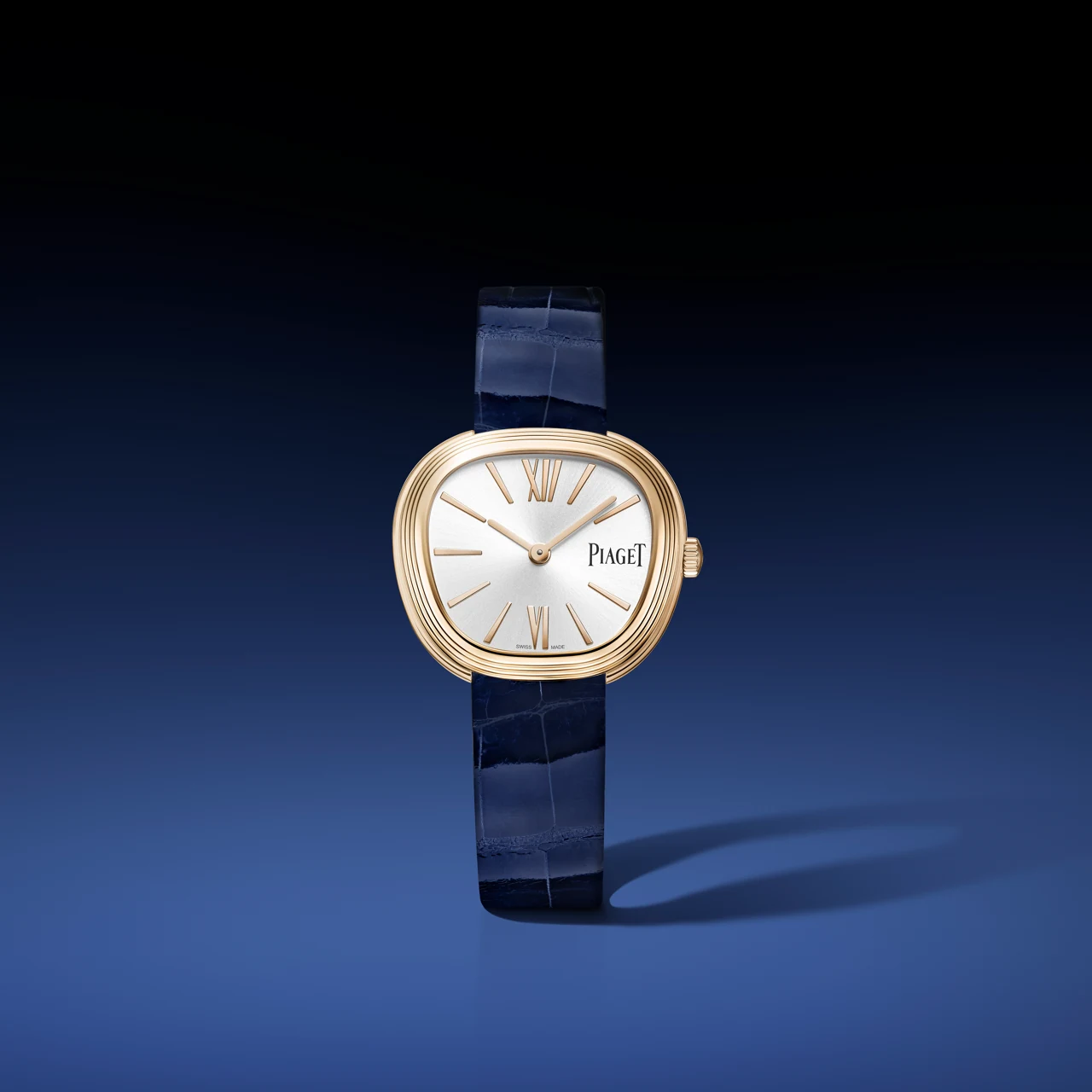 Piaget Sixtie blue quartz dial on dark blue alligator strap — close-up of marbled stone face
