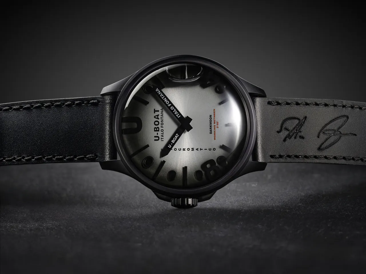 U-BOAT Darkmoon KAMA grey dial with purple photochromic shift under sunlight