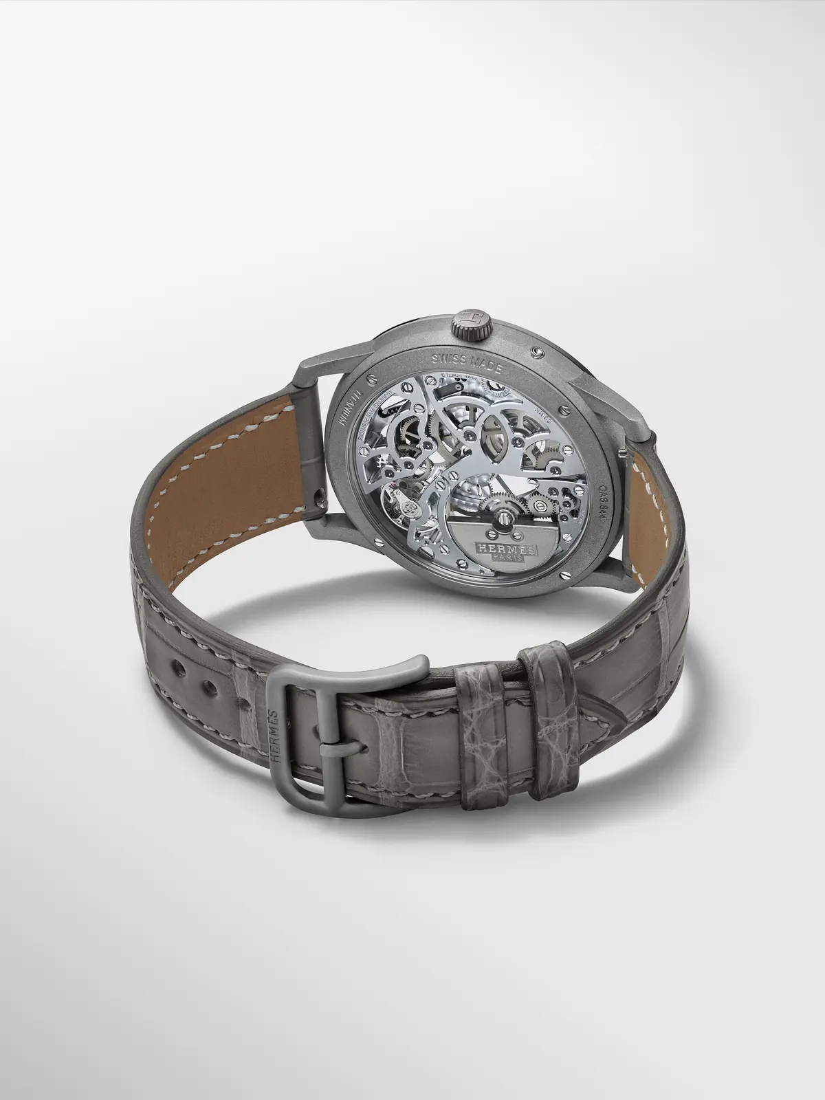Hermès Slim d'Hermès Squelette Lune blue version with H1953 skeleton movement visible through the dial