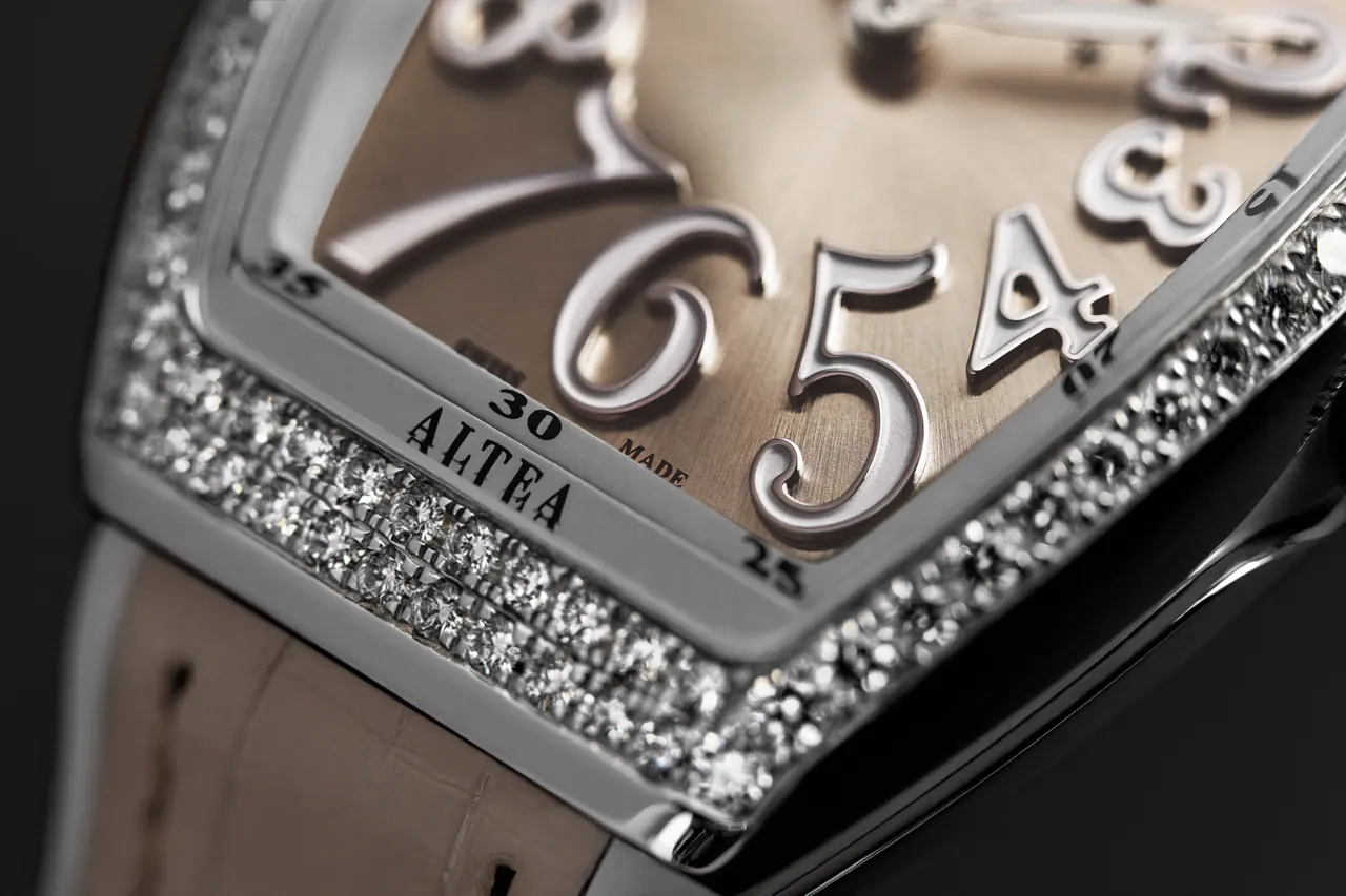 Vanguard Altea tonneau case detail showing hand-applied numerals and diamond bezel