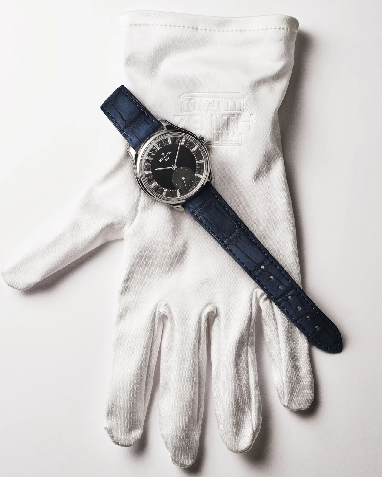 Zenith G.F.J. in tantalum showing brick-pattern guilloché outer ring and grey mother-of-pearl small-seconds counter