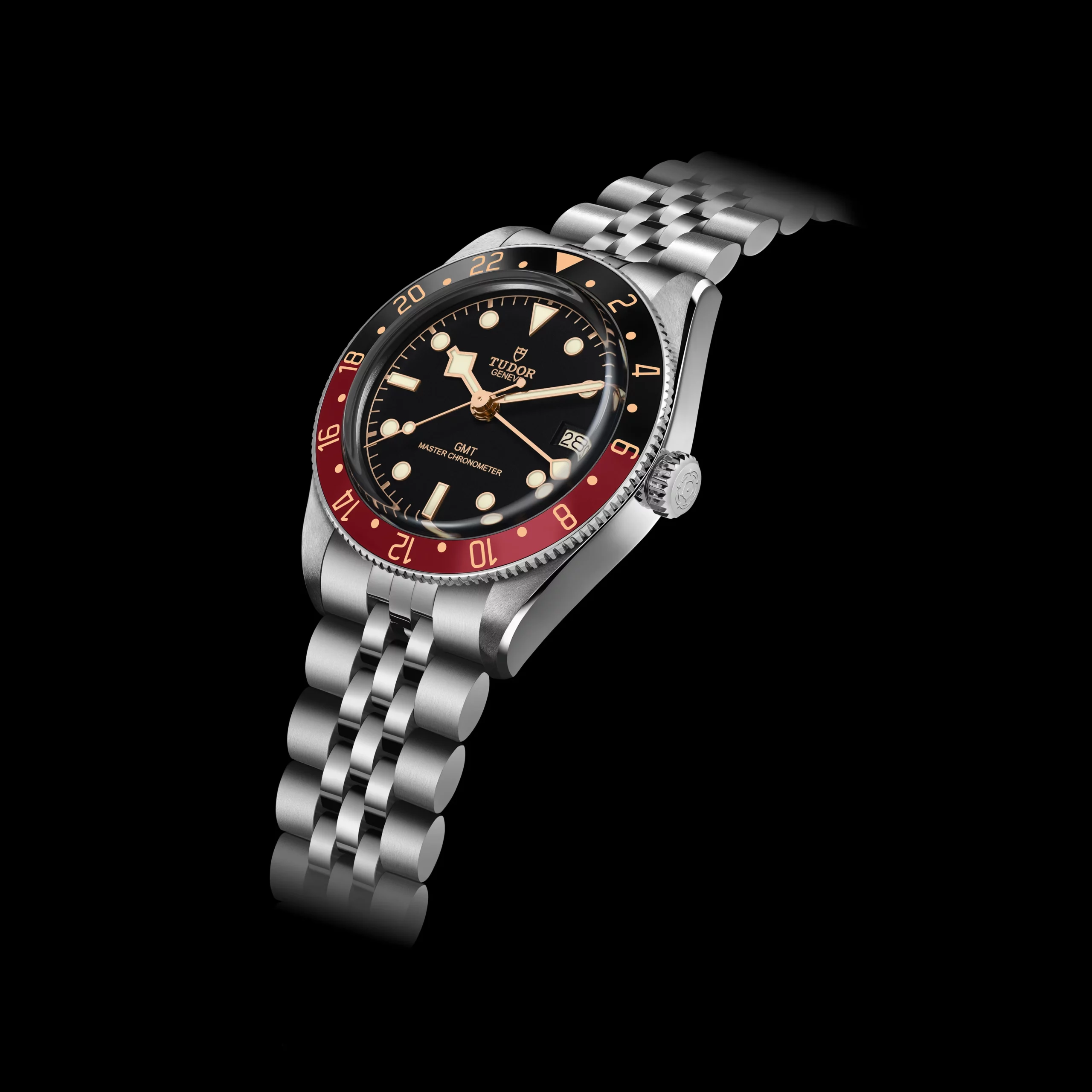 TUDOR Black Bay 58 GMT on rivet-style three-link bracelet showing T-fit clasp