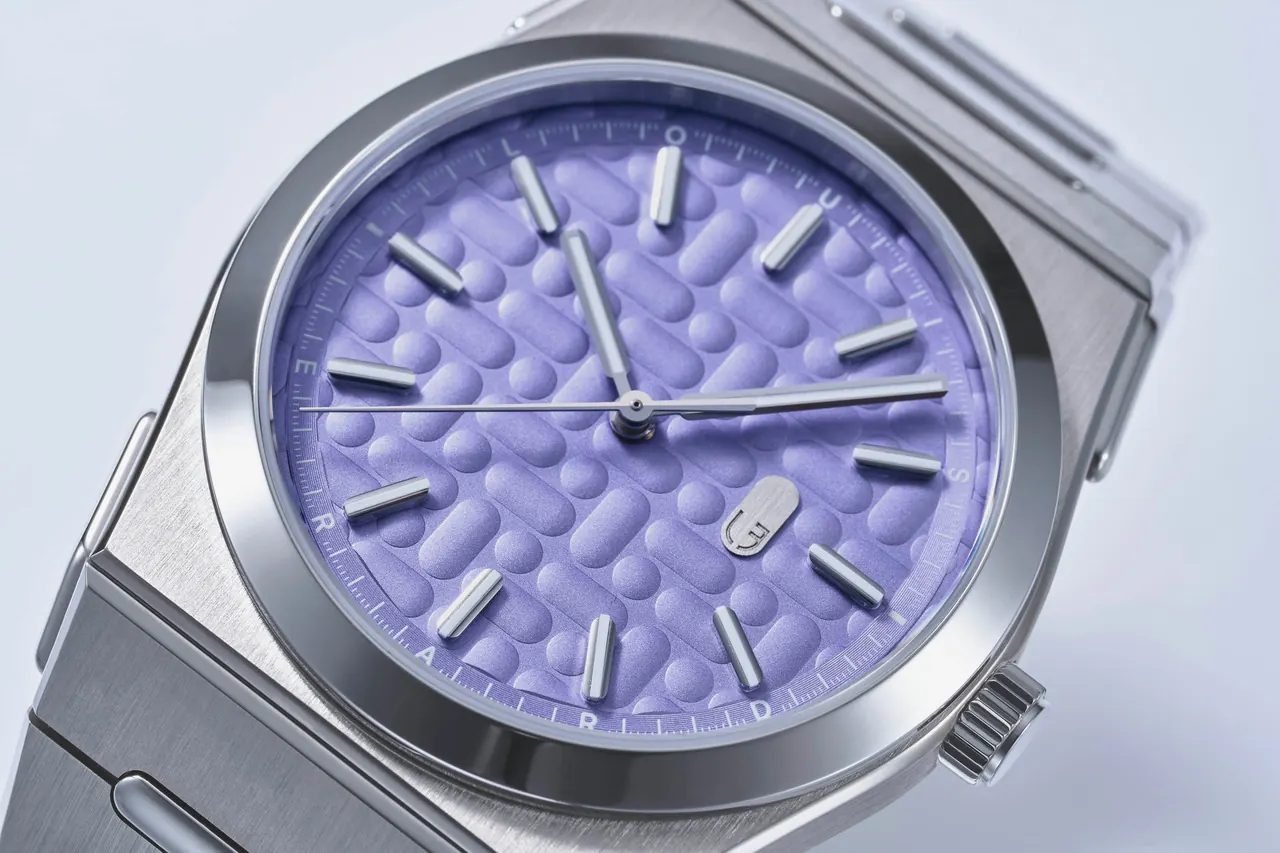 Louis Erard 2340 Mauve and Forest side-by-side comparison on integrated bracelet