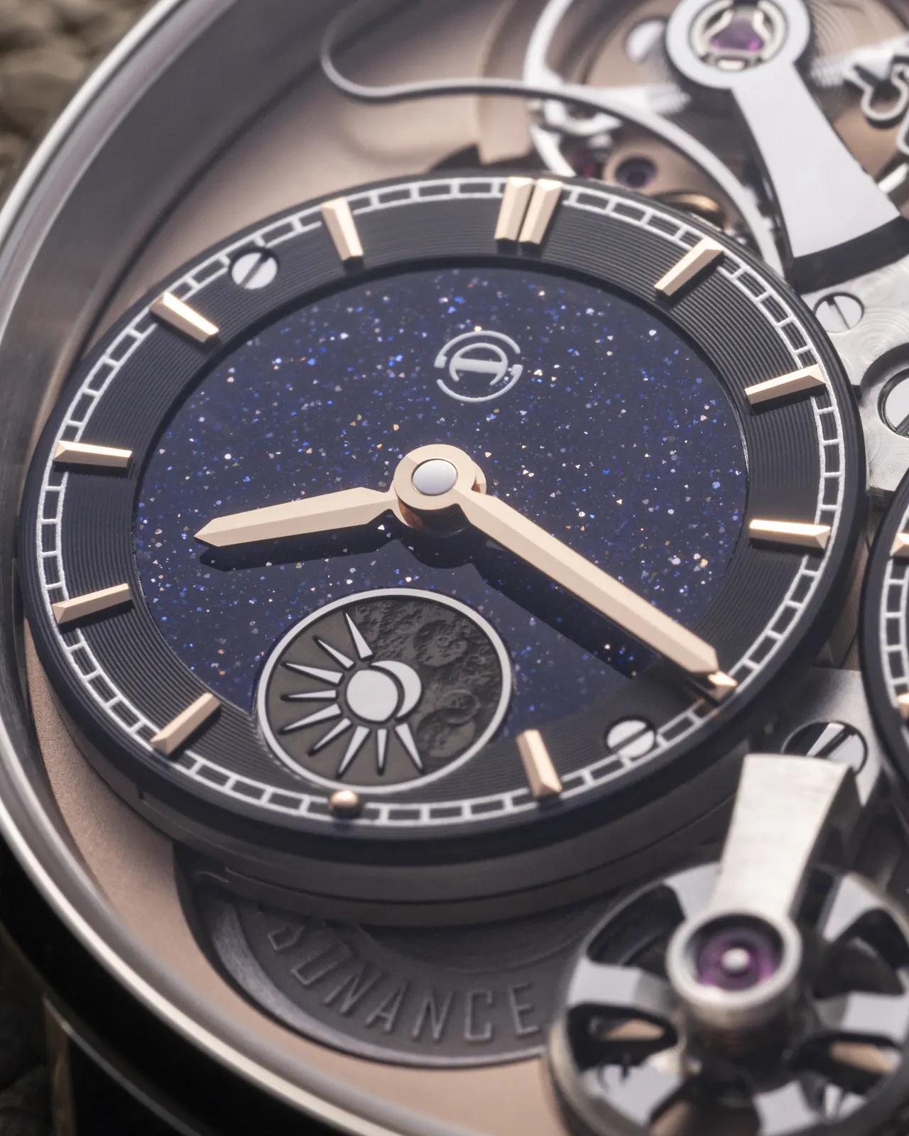 Mirror-polished balance bridge detail on Armin Strom Resonance Aventurine