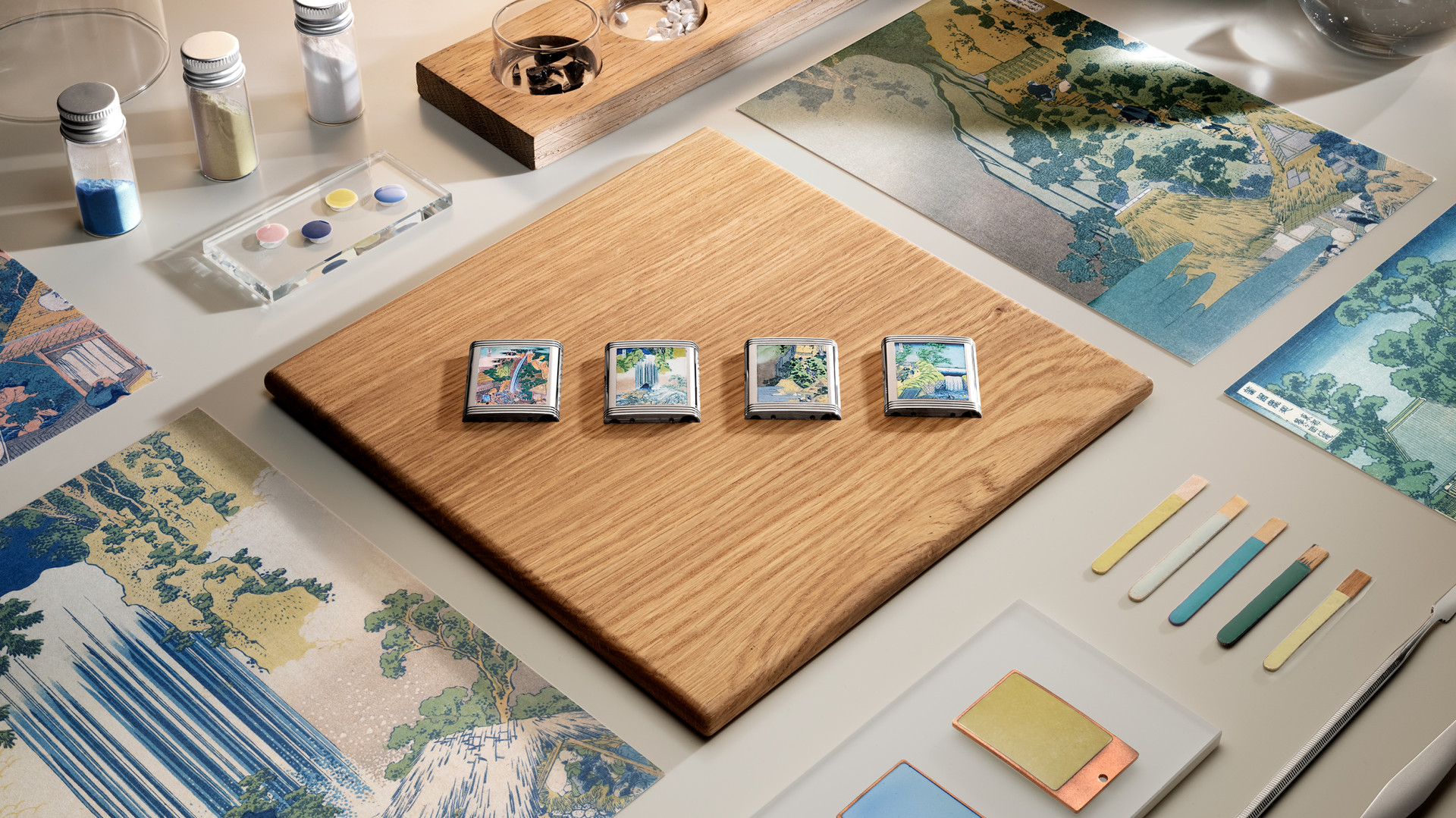 Miniature-painted enamel caseback depicting a Hokusai waterfall scene