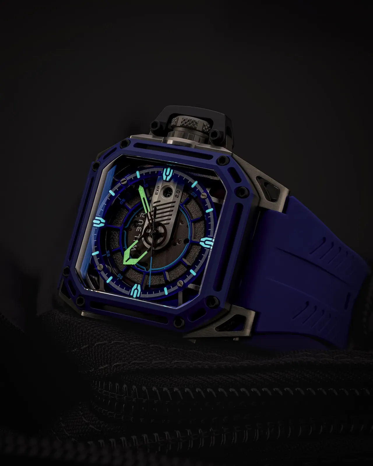 Wilbur Supermachines Battlefield MK1 EXP 2.0 titanium and blue ceramic exoskeleton case front view