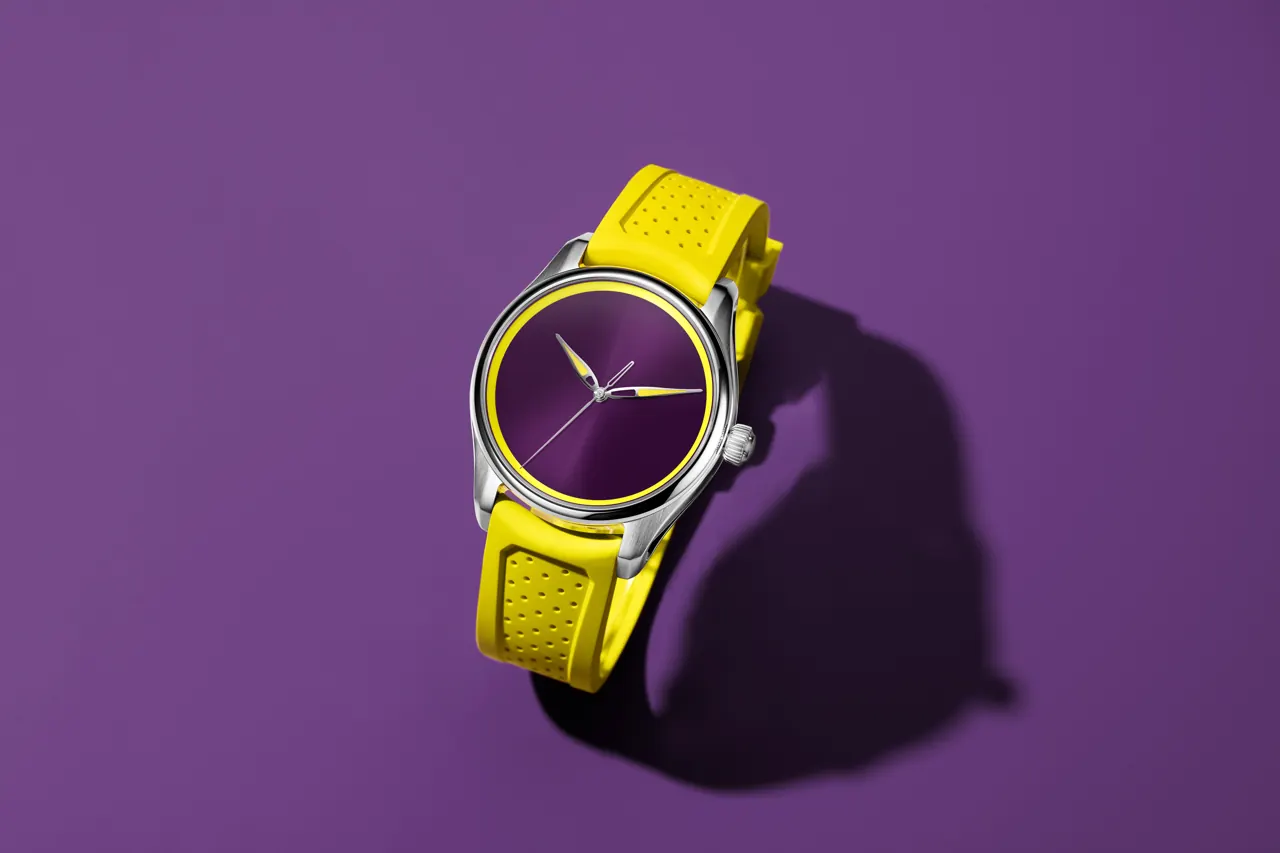 H. Moser & Cie. Pioneer Centre Seconds Sun Berry Berry Purple fumé dial with yellow hands on yellow rubber strap