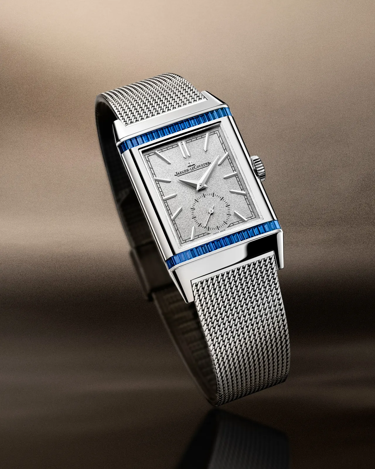 Reverso Or Deco collection with coloured gemstones on Milanese bracelet