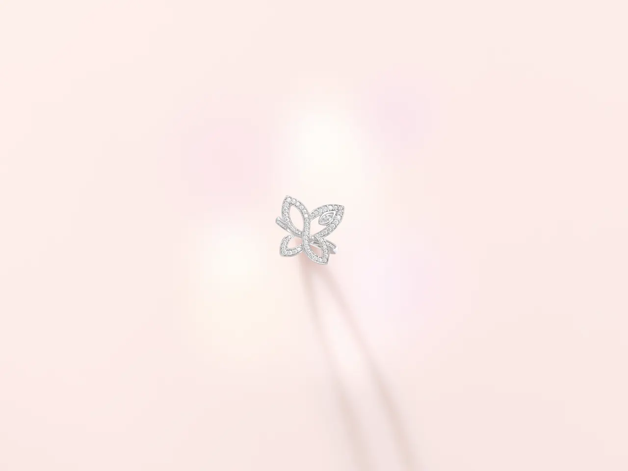 Harry Winston Infinite Lily Cluster pendant featuring marquise and round brilliant diamonds in platinum