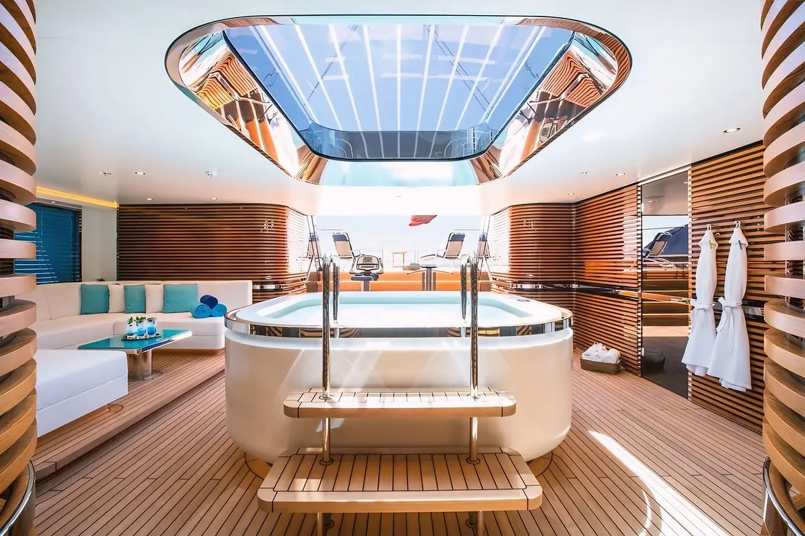 Aquijo superyacht aft deck and beach club with ocean access, designed by Dölker + Voges