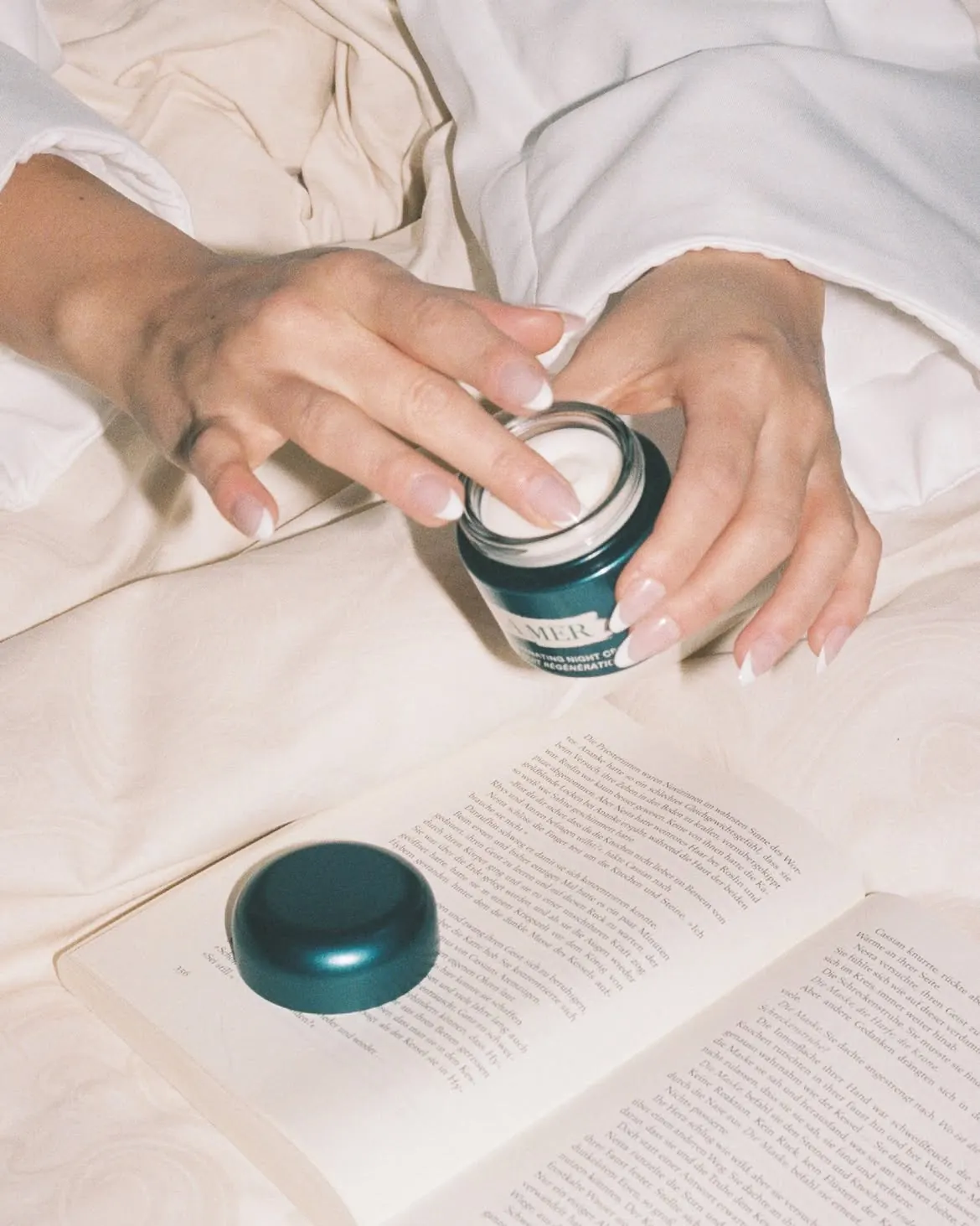 Close-up of La Mer Rejuvenating Eye Cream texture showing the silky-rich formula