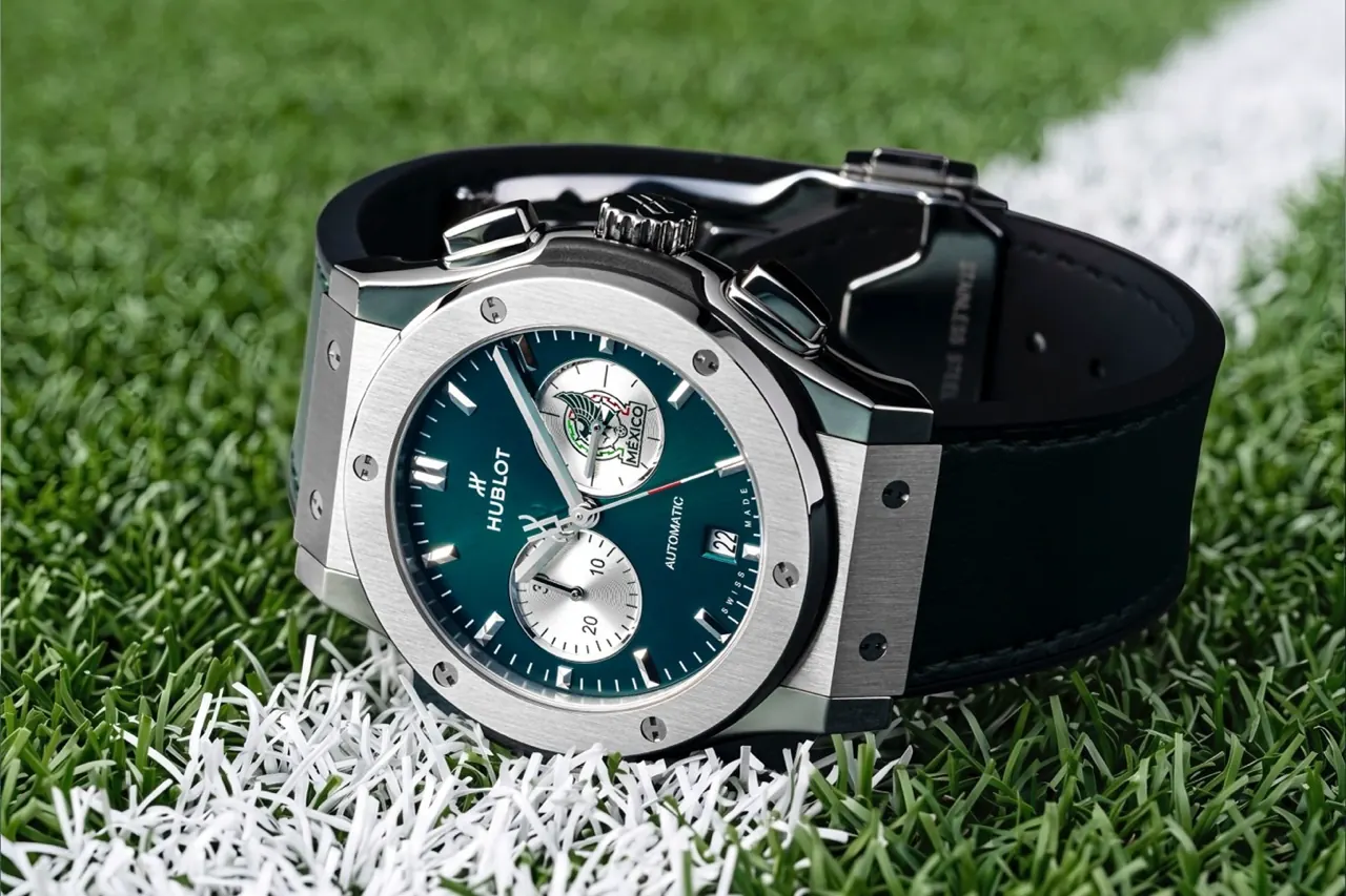 Close-up of the sunny green dial with red chronograph seconds hand and Mexican National Team logo