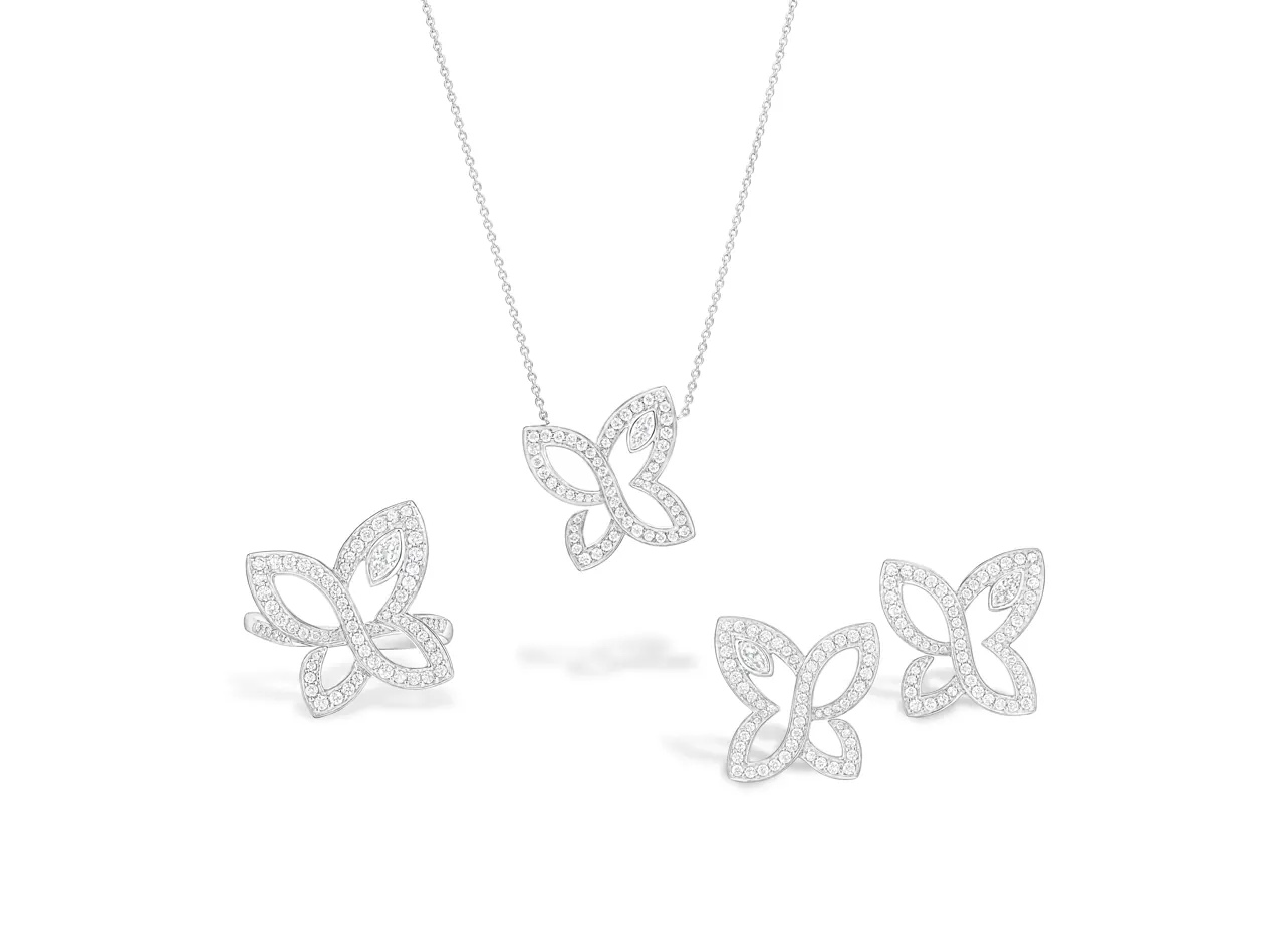 Harry Winston Lily Cluster ring and earrings set in platinum with marquise-cut diamond