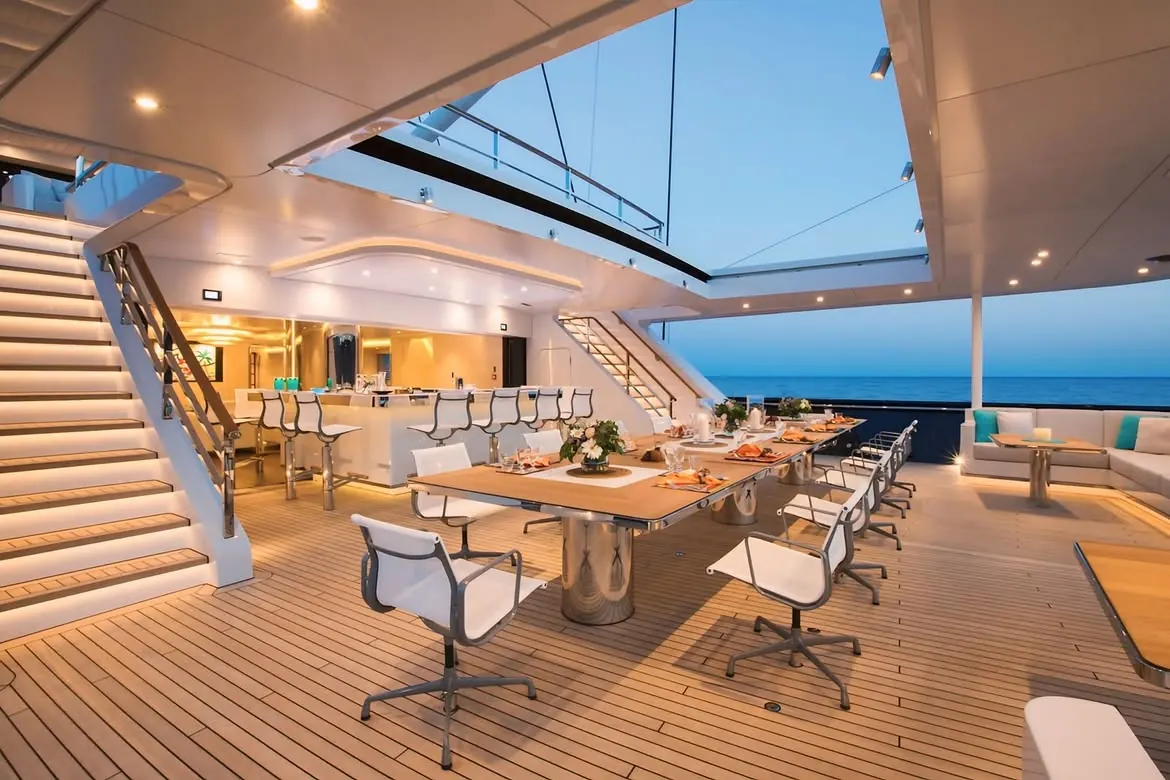 Aquijo interior four-deck layout with stainless steel and wood materials by Dölker Voges
