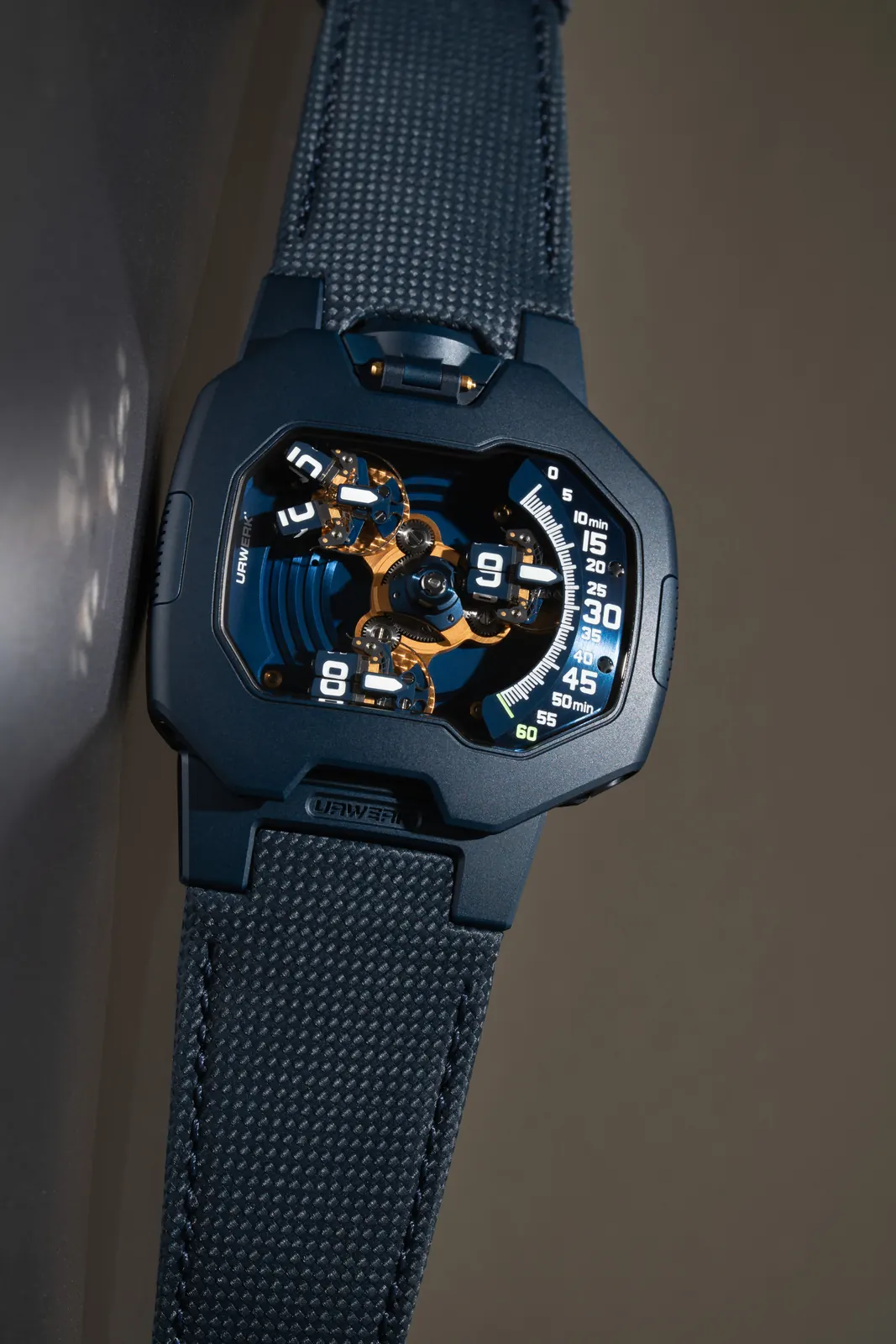 URWERK UR-120 Blue Planet articulated lugs and sapphire crystal close-up