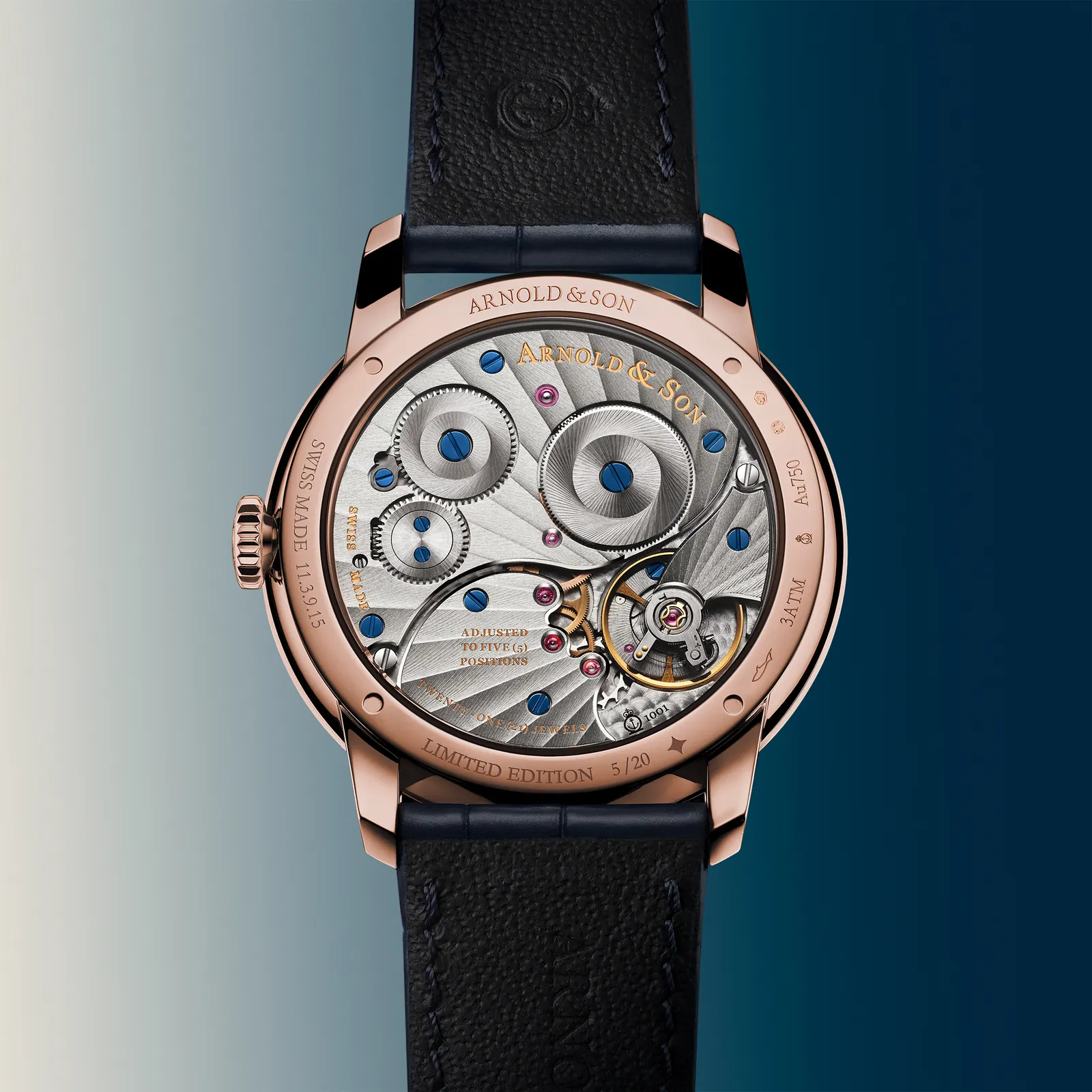 Arnold & Son A&S 1001 calibre sapphire caseback showing Côtes de Genève and blued screws