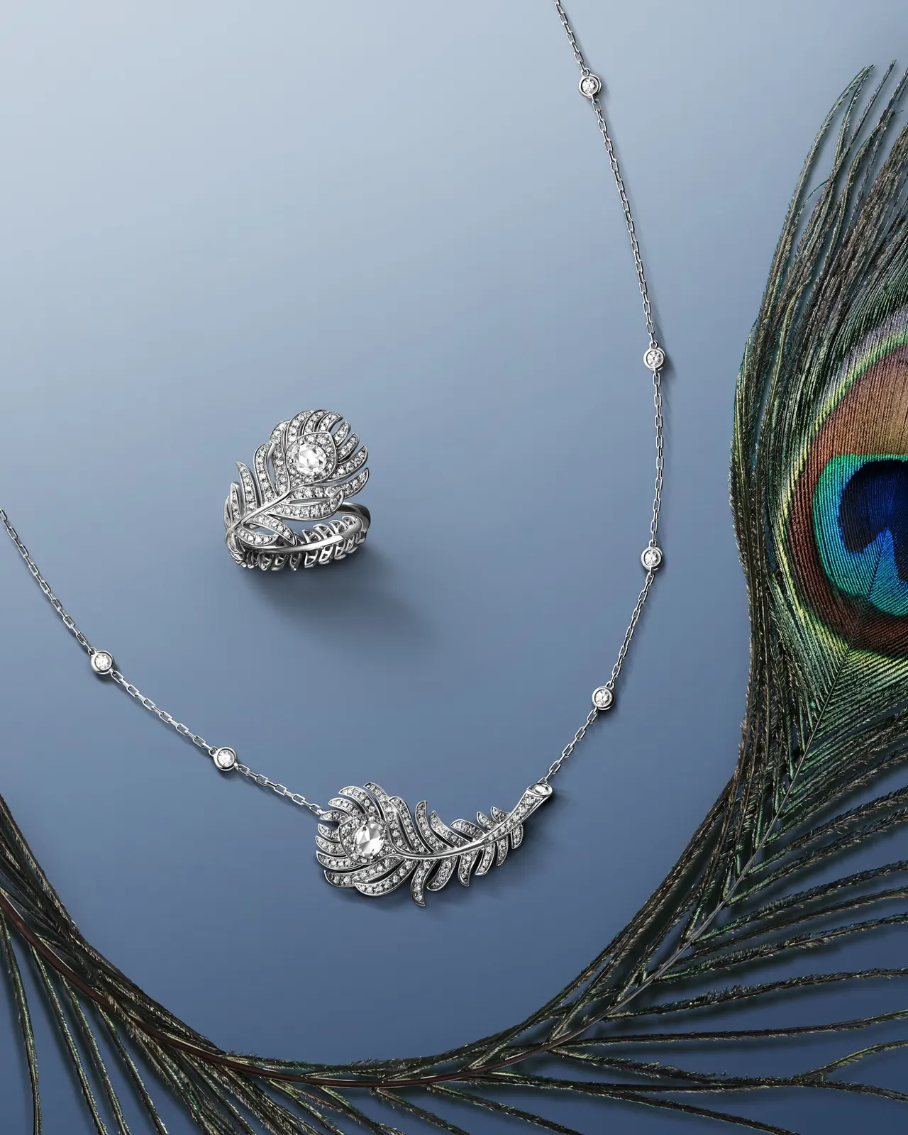 Boucheron Plume de Paon pendant earrings in white gold with rose-cut diamonds and articulated diamond pavé