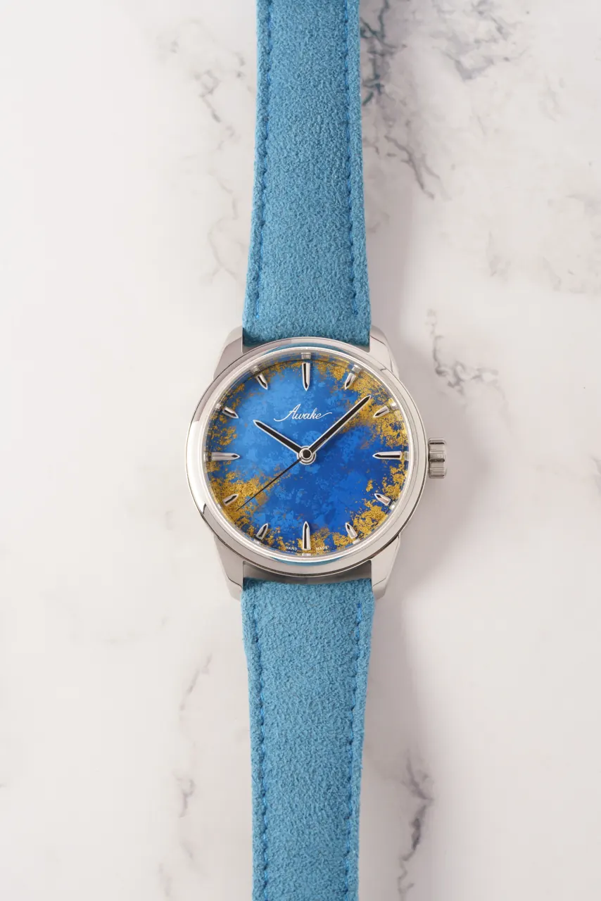 AWAKE Royal Blue dial showing pure gold leaf and blue lacquer layers, 38mm stainless steel case