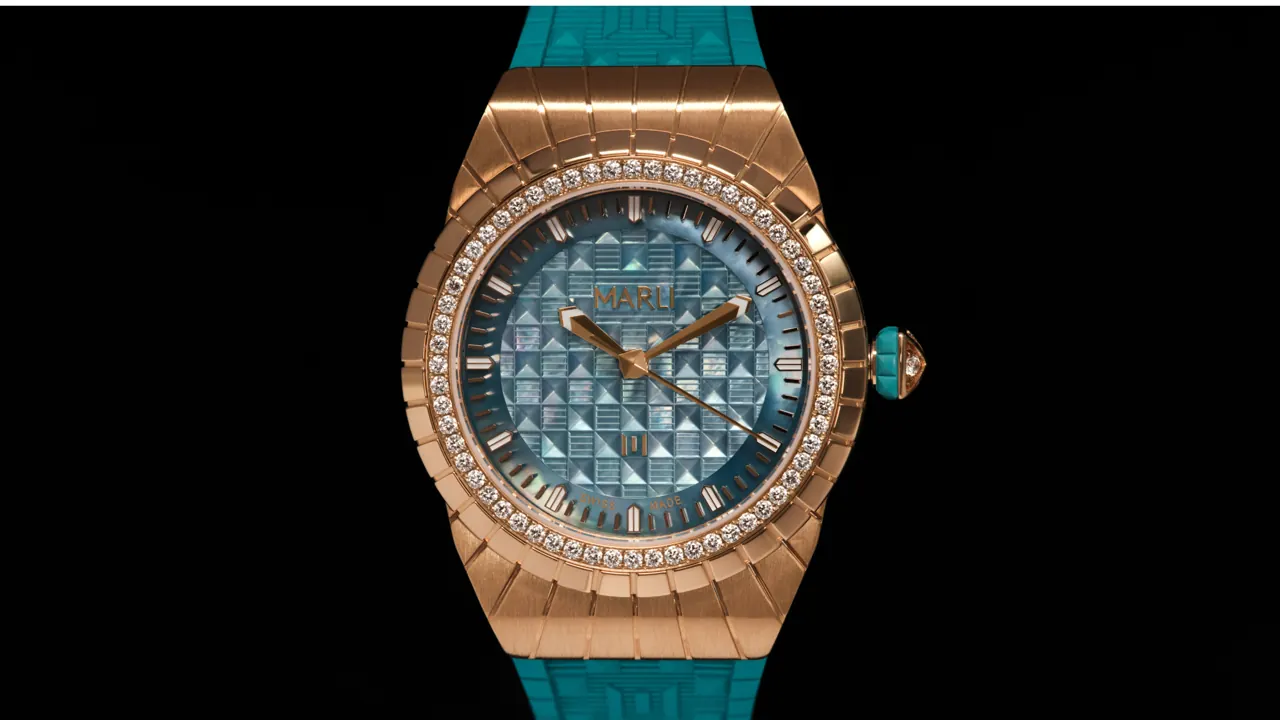 Marli New York Teal L35 in 18K rose gold with mother-of-pearl dial and teal rubber strap