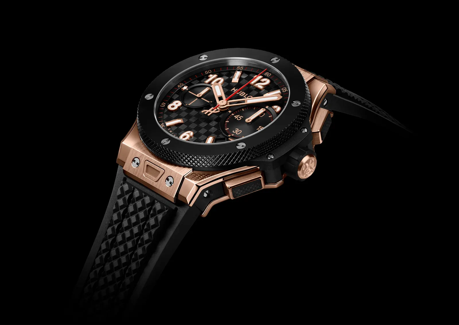 Hublot Big Bang 20th Anniversary King Gold Ceramic dial detail showing carbon-effect finish and Unico movement
