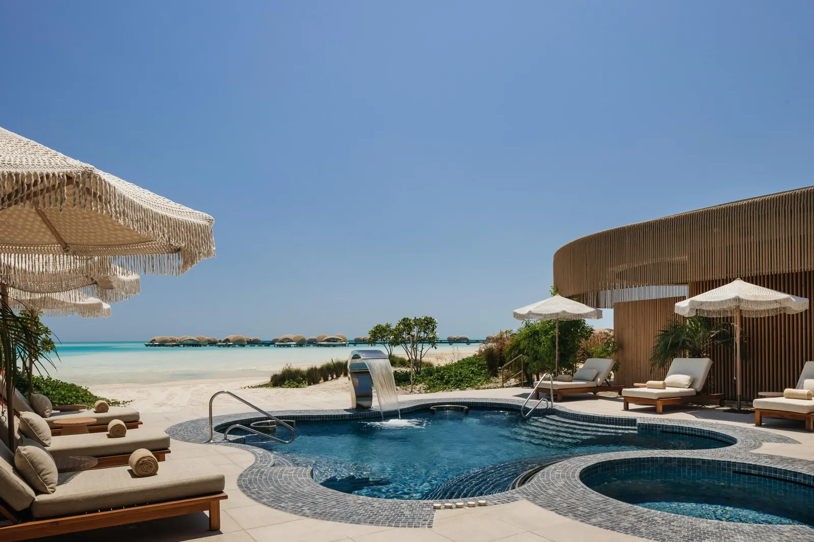 Neyrah Spa treatment room opening onto the beach at Nujuma a Ritz-Carlton Reserve Ummahat Islands Red Sea Saudi Arabia