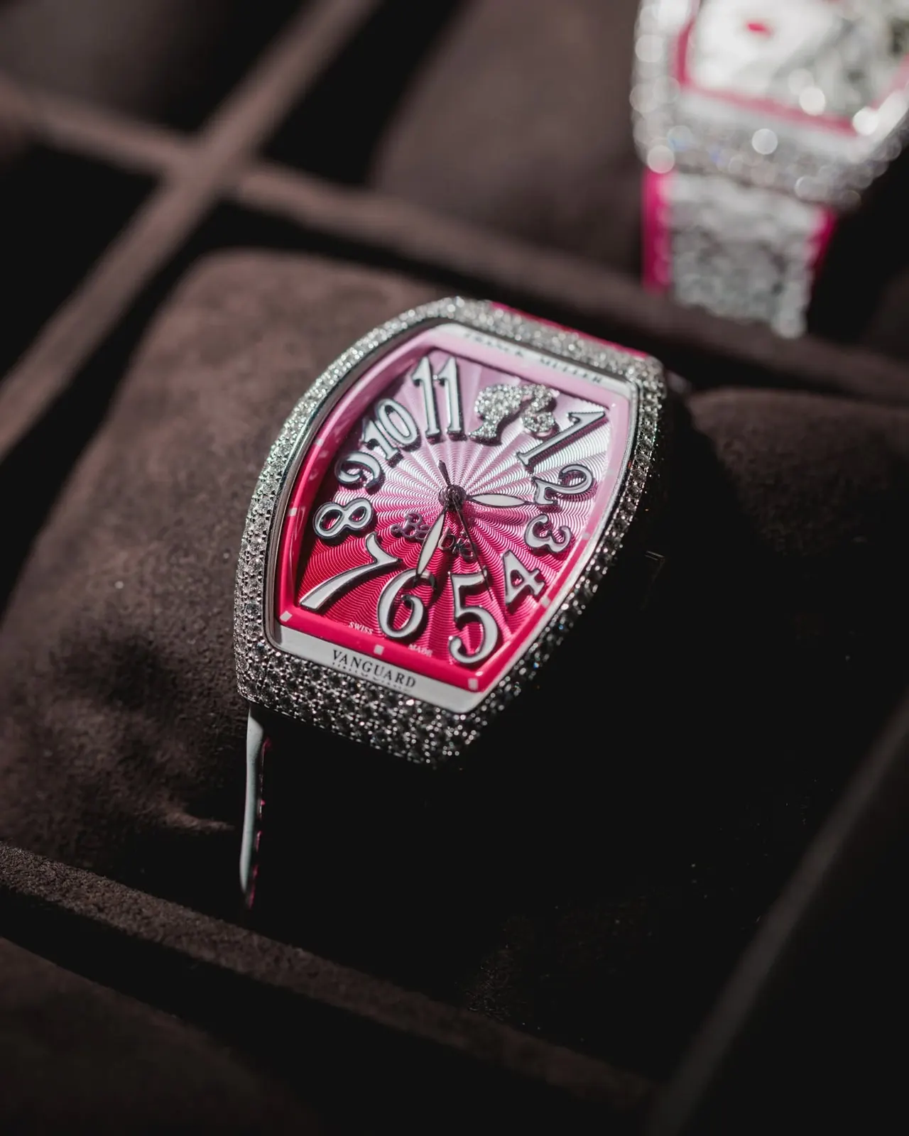 Franck Muller Vanguard Barbie collection watch dial close-up showing vibrant pink Barbie codes on tonneau case