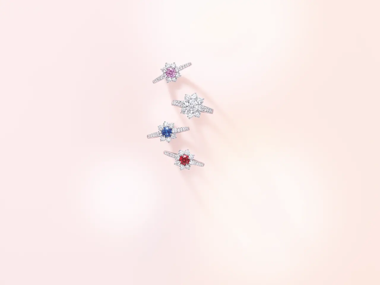 Harry Winston Sunflower ring featuring yellow diamond centre encircled by eight diamonds
