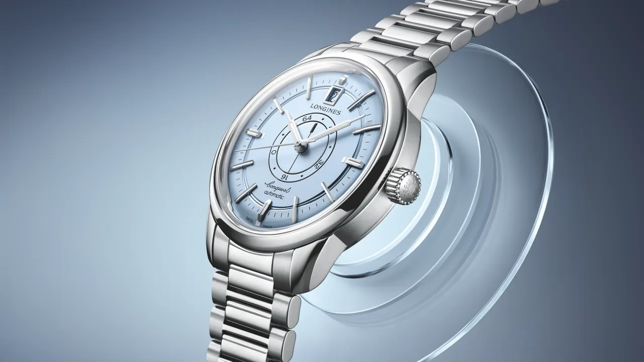Longines Conquest Heritage Central Power Reserve showing central rotating-disc power reserve display on light blue dial