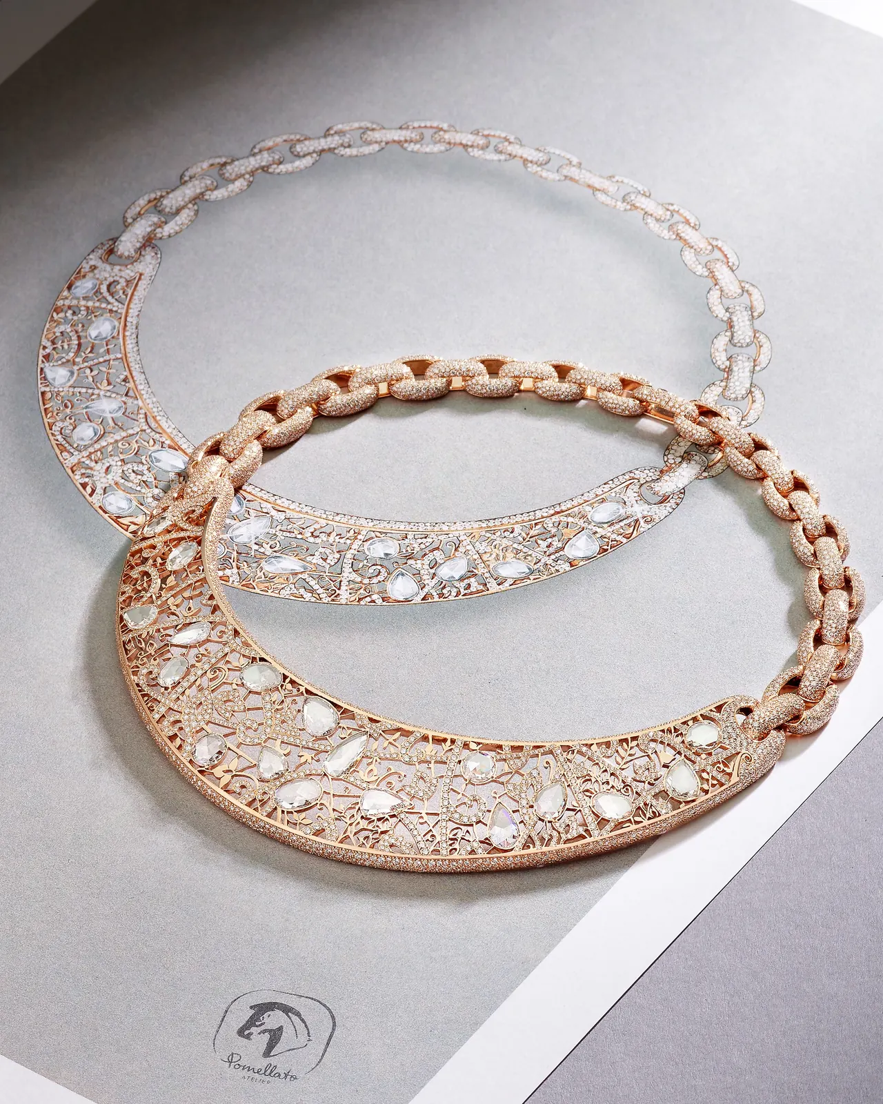 Close-up of Pomellato Arabesque necklace crescent-shaped collar showing rose-cut and brilliant-cut diamond pavé set within gold lace pattern