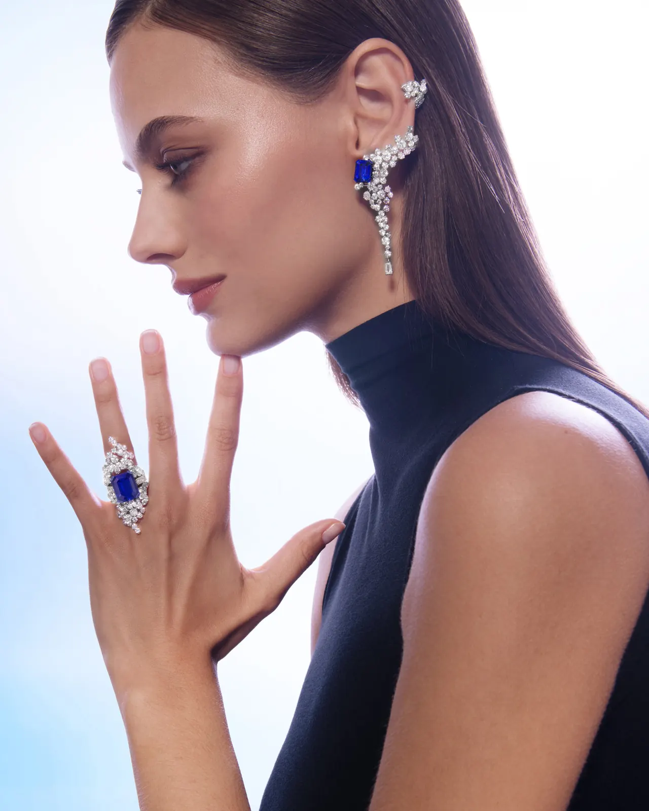 FRED Moonlight Reflection set detail showing emerald-cut tanzanites and asymmetric diamond clusters
