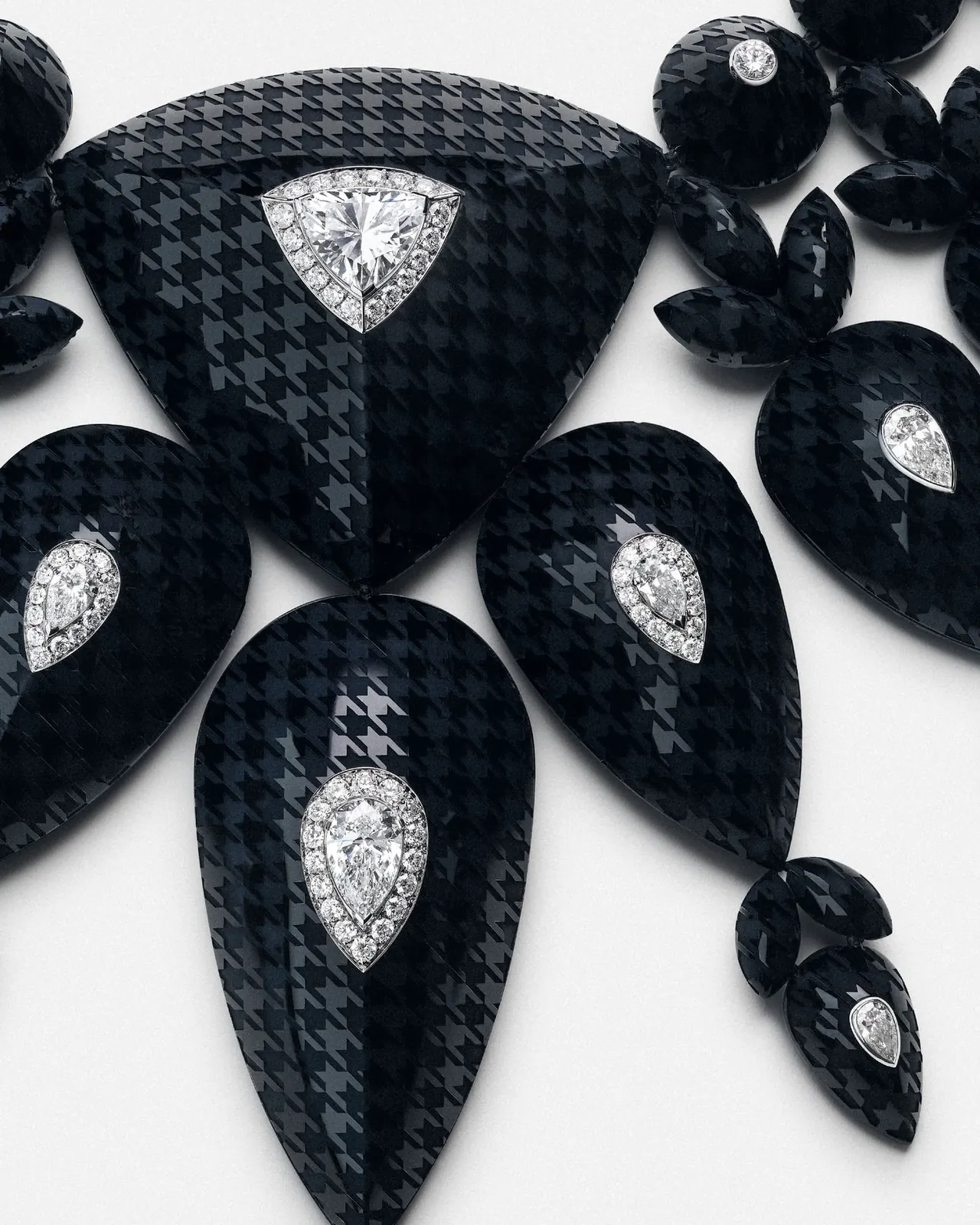 Boucheron Human Being – Checkers set showing houndstooth pattern laser-engraved into 1,535 carats of onyx