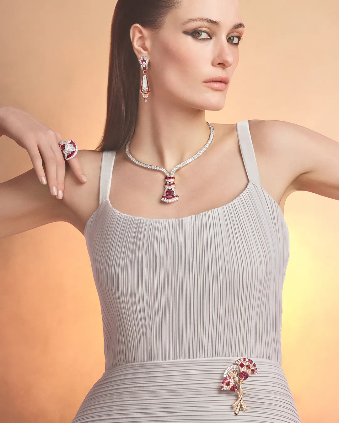 Baguette-cut rubies and diamonds detail on the Van Cleef and Arpels Fleur de Lotus Mysterieuse clip