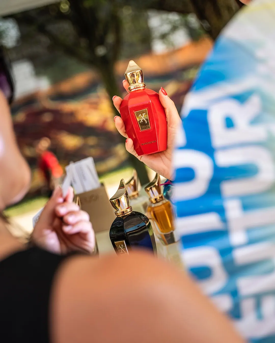 Kappa FuturFestival attendees experiencing Xerjoff perfumes at the VIP terrace