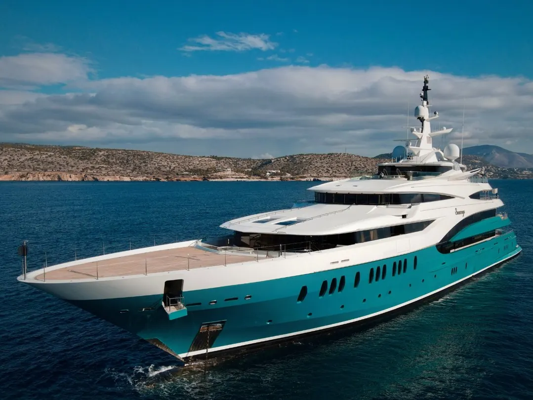 Oceanco Sunrays interior by Terence Disdale featuring mid-toned warm tones with Oriental influence