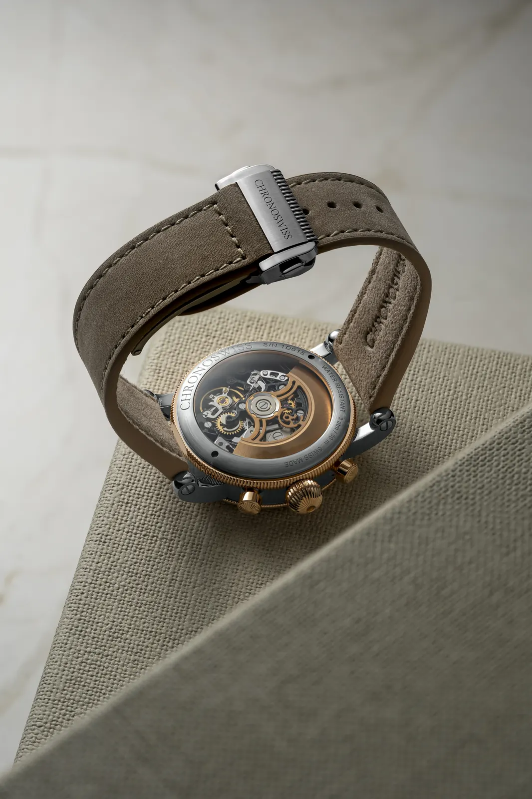 Chronoswiss Opus Dakar Sundown caseback with sapphire crystal and red gold coin edge ring