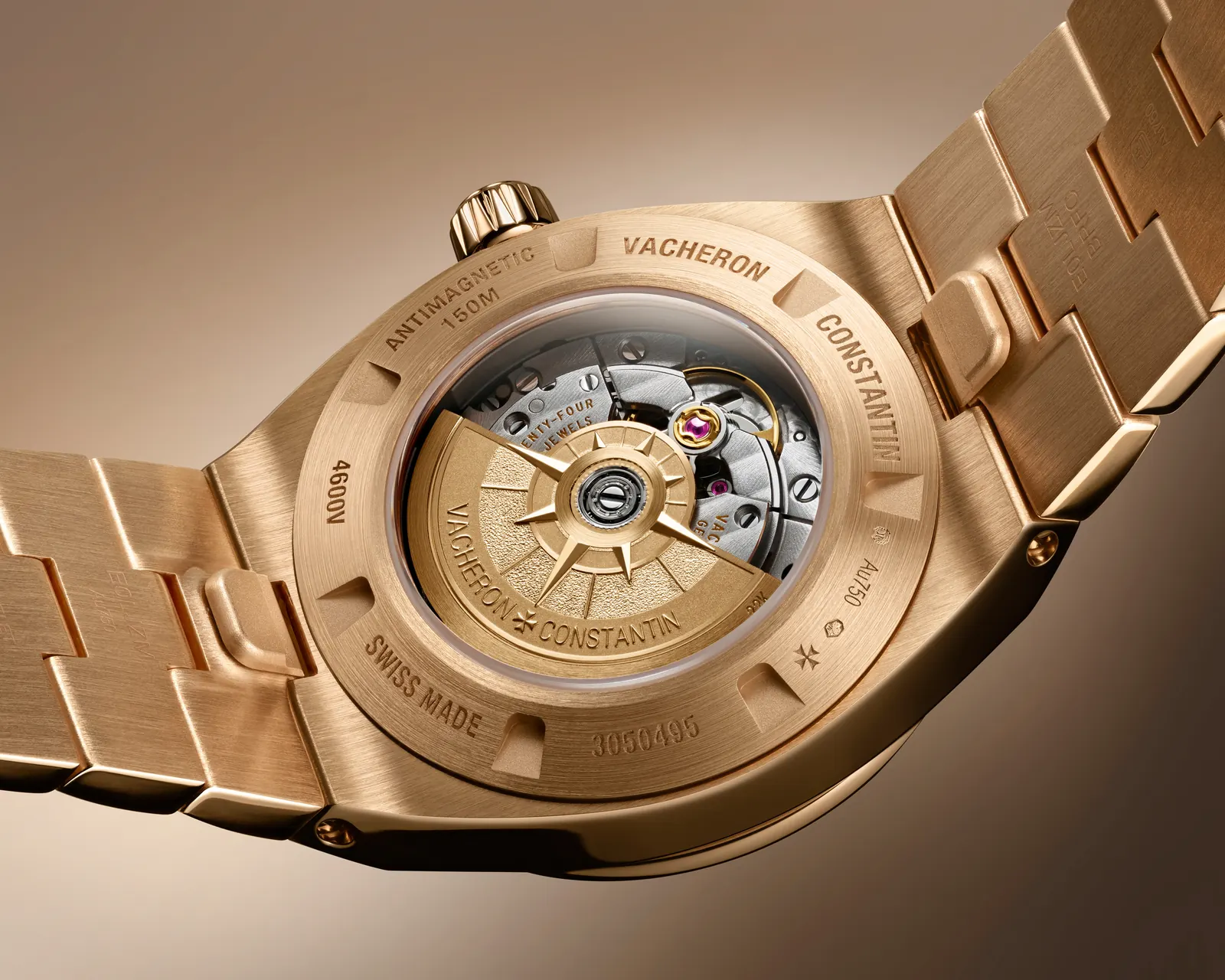 Overseas 34.5 mm rose gold and steel versions side by side on white background