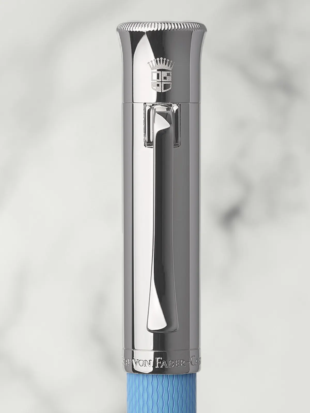 Graf von Faber-Castell Guilloche Gulf Blue fountain pen showing guilloché engraved barrel and rhodium-plated cap