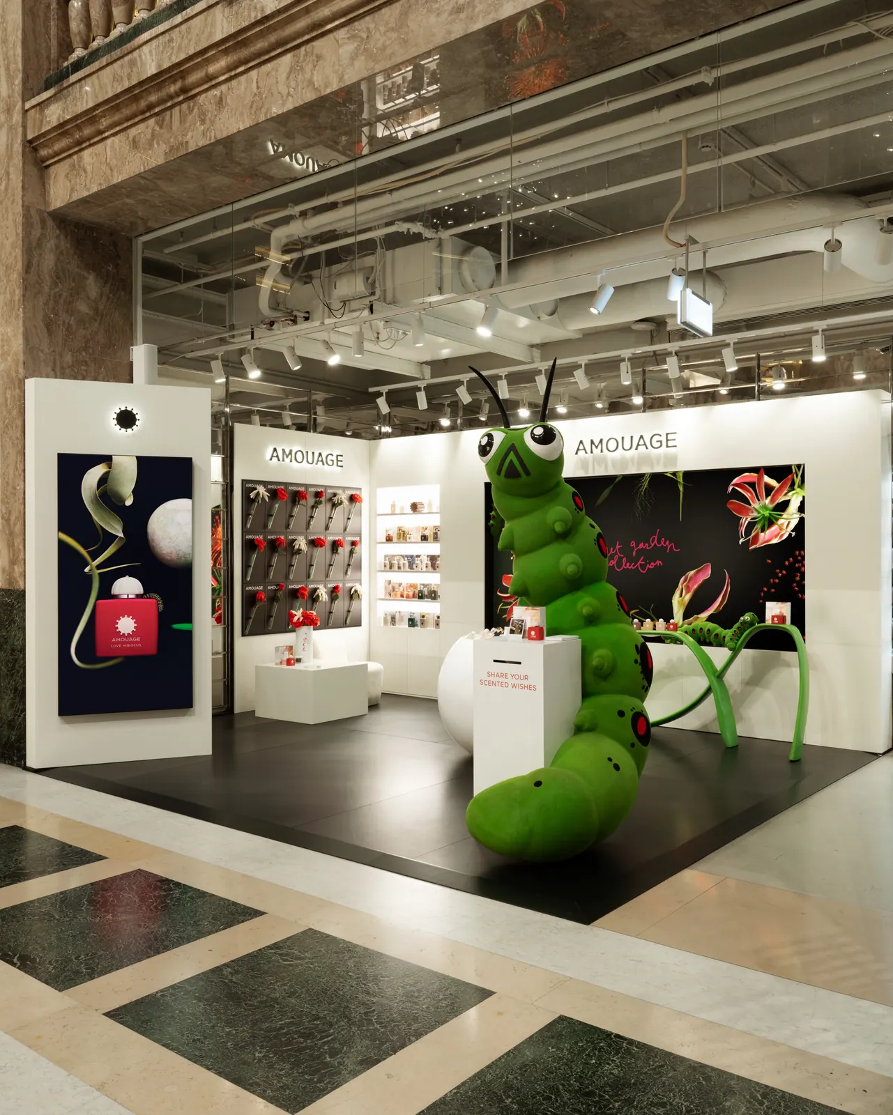 Amouage Love Hibiscus pop-up interior at Galeries Lafayette Champs-&Eacute;lys&eacute;es Paris showing crimson scenography