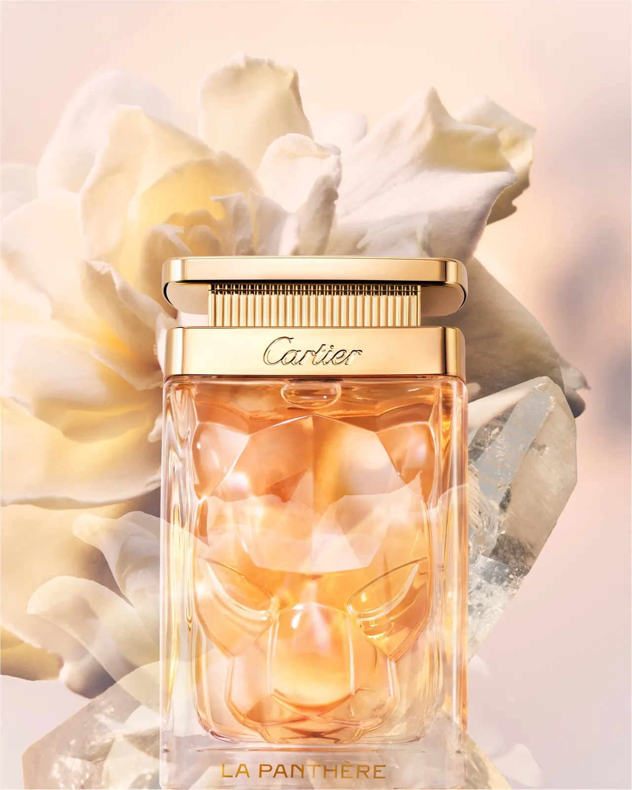 Cartier La Panthère Parfum faceted glass bottle with sculpted panther face
