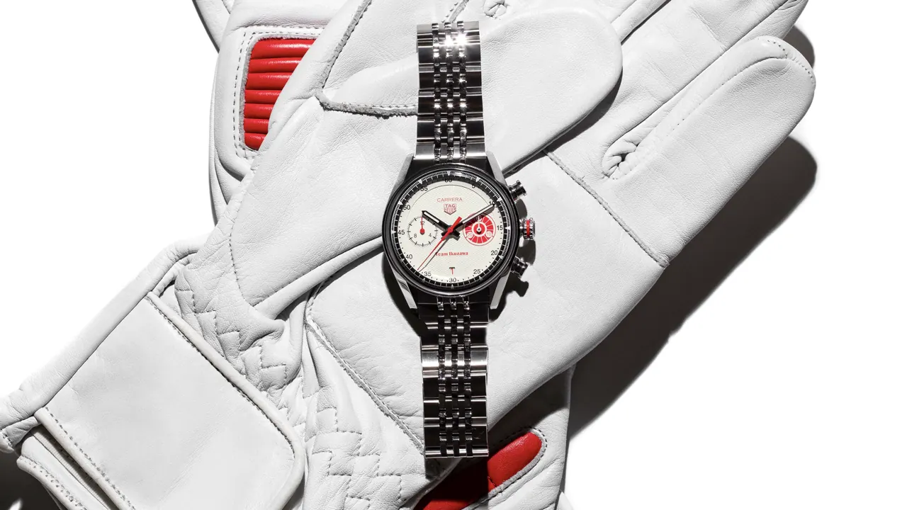 Close-up of the white Clou de Paris dial and black flange on the TAG Heuer Carrera x Team Ikuzawa