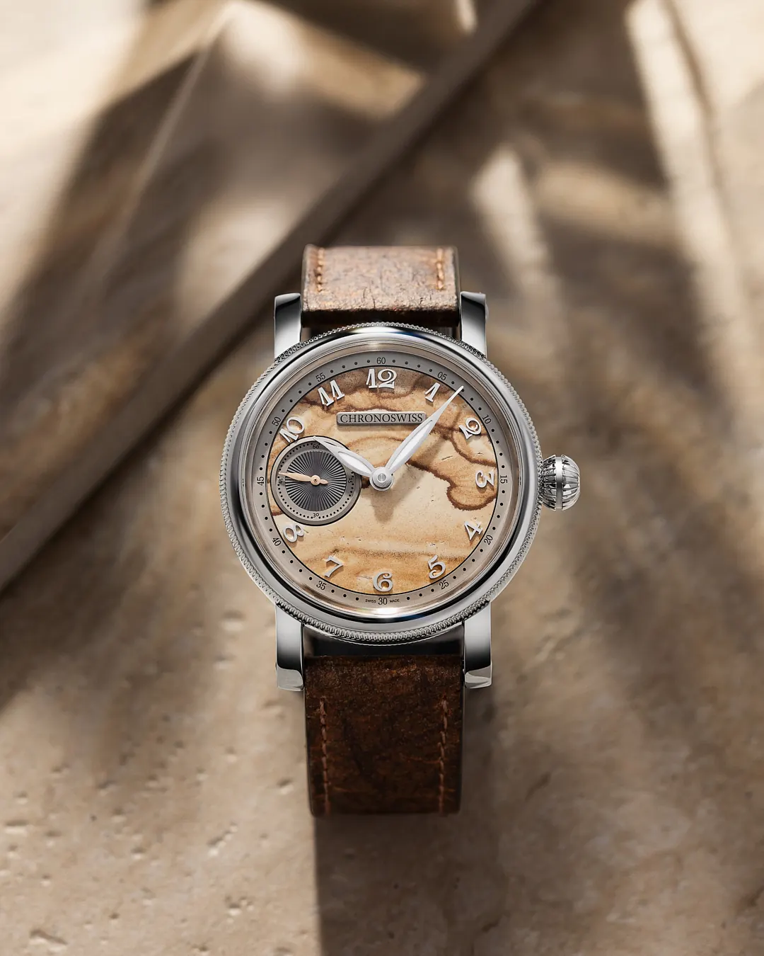 Chronoswiss Small Second Jasper warm beige stone dial close-up showing natural veining