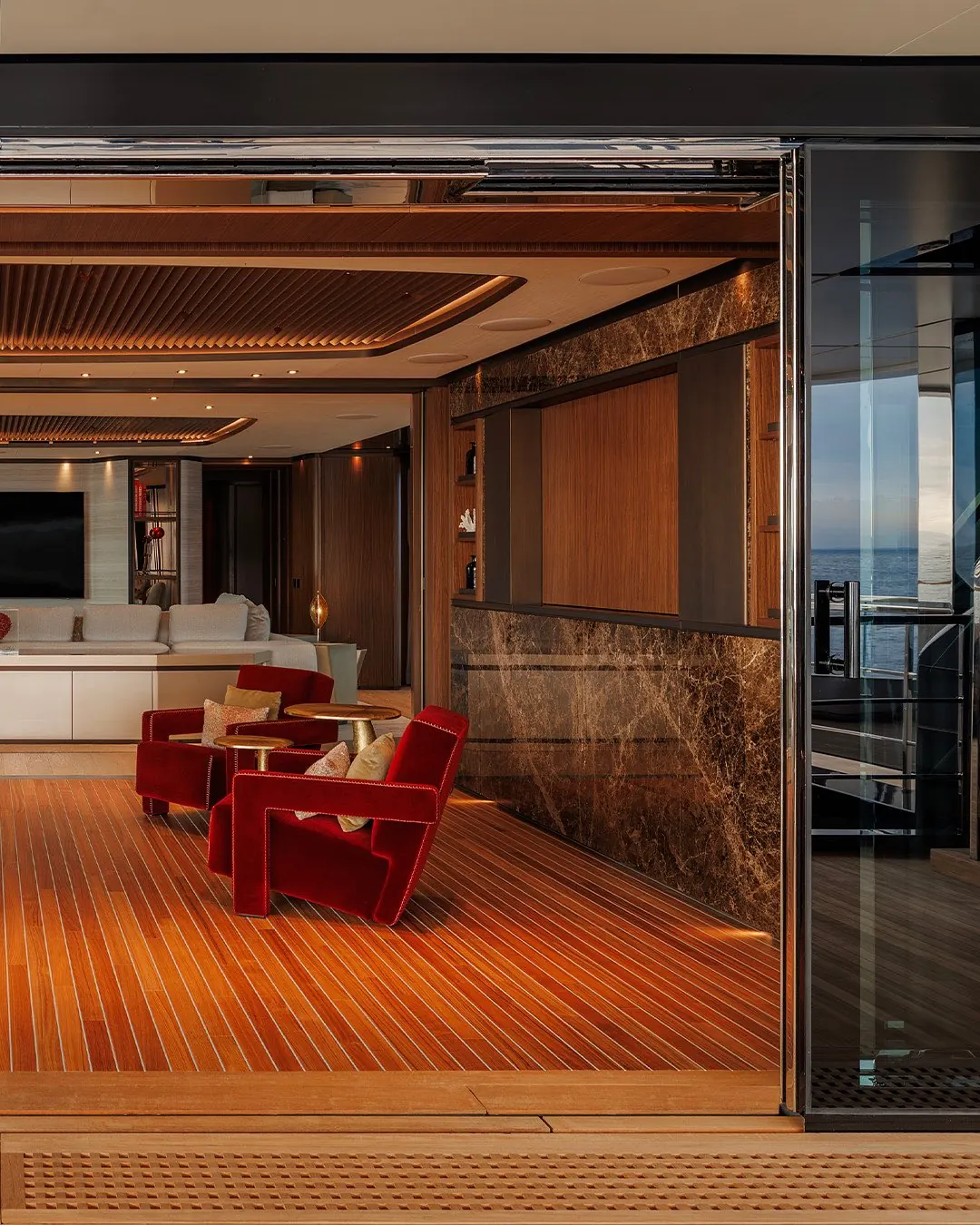 Triple-height lobby and interior design by Studio Paolo Ferrari aboard Sanlorenzo 74Steel Virtuosity